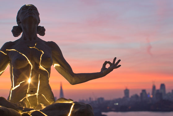Paige Bradley's Metamorphosis — a cracked figure lit from within